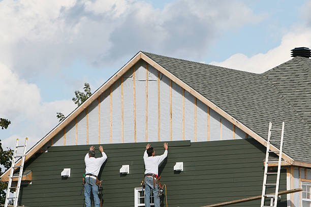 Professional Siding technician working in Pelham, GA